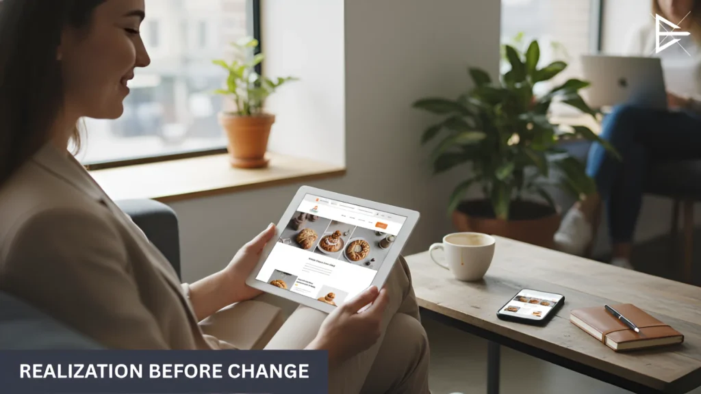 Business owner reviewing a website on a tablet while pausing to consider what changes actually matter.