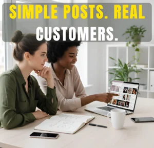 Two professionals sitting at a desk reviewing social media content on a laptop, discussing post ideas together in a relaxed workspace.